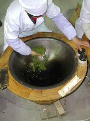 Lung Ching Herstellung in Eisenpafanne
